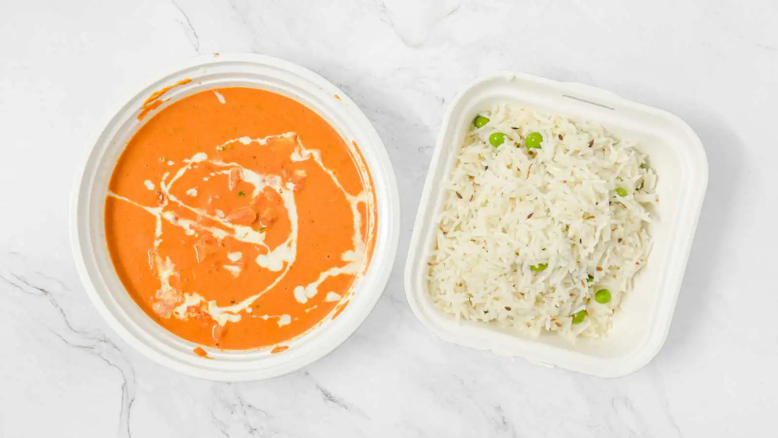 Butter chicken and rice at ClubHouse Pizza and Chicken in Winnipeg