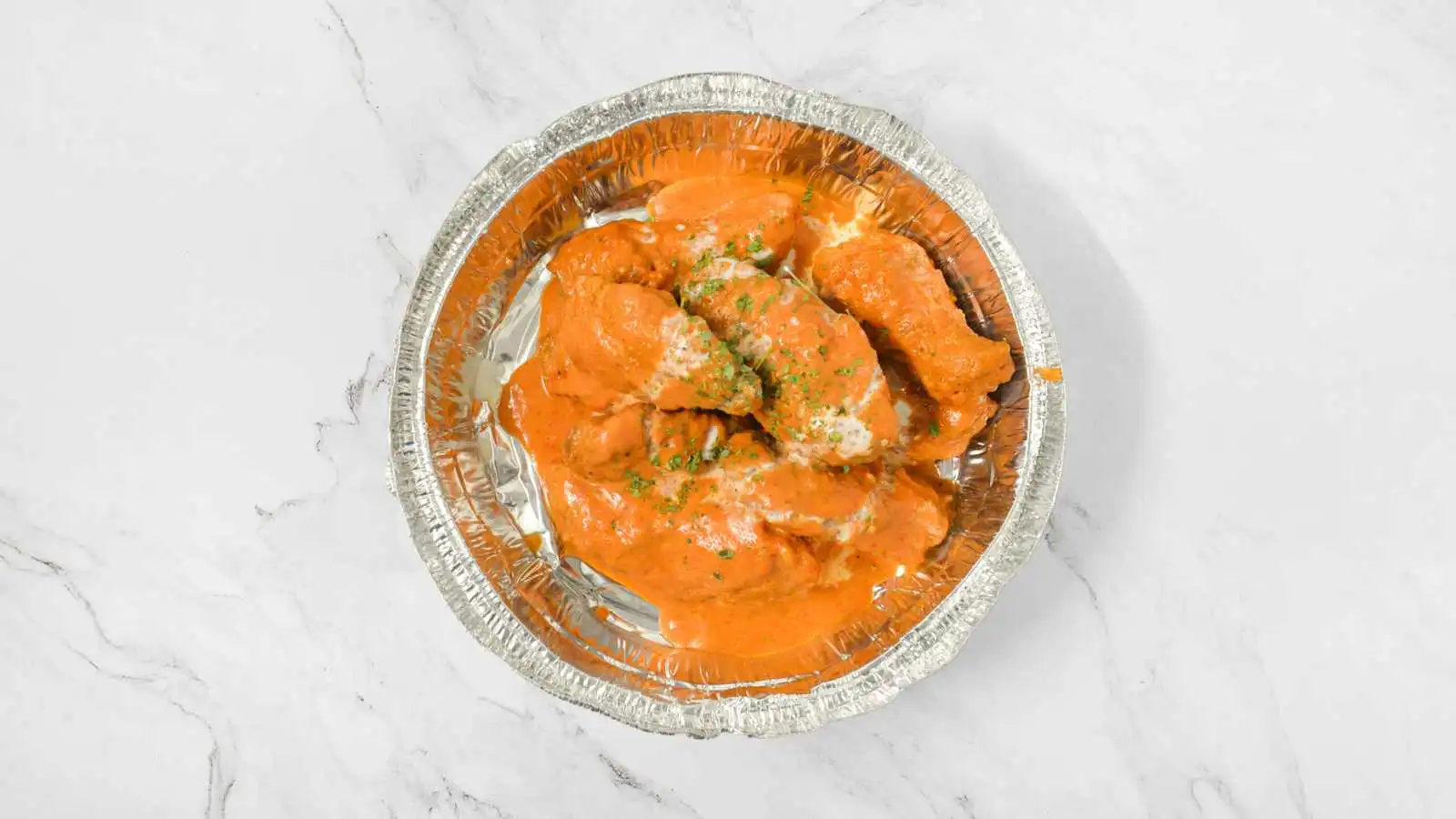 Butter chicken wings at ClubHouse Pizza and Chicken in Winnipeg